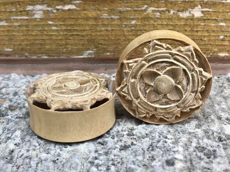 Wood carved flower plugs